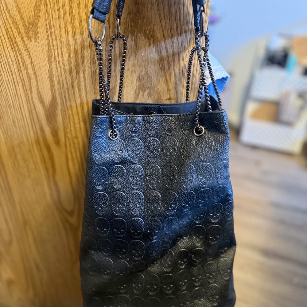 Black Skull-Embossed Shoulder Bag with Chain Straps